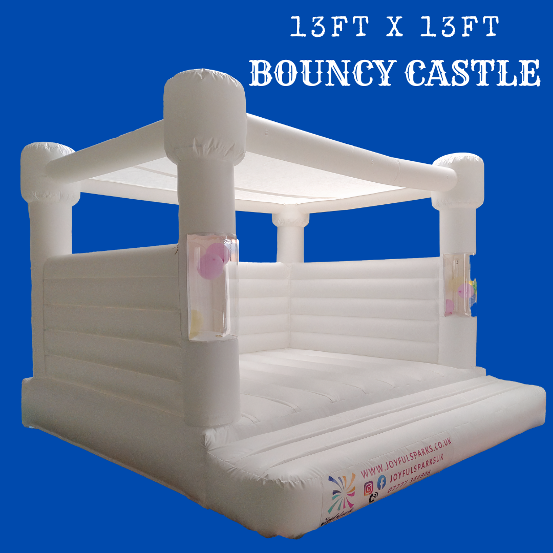 Hire Our 13ft White Bouncy Castle with Bubble Balloon Pillars